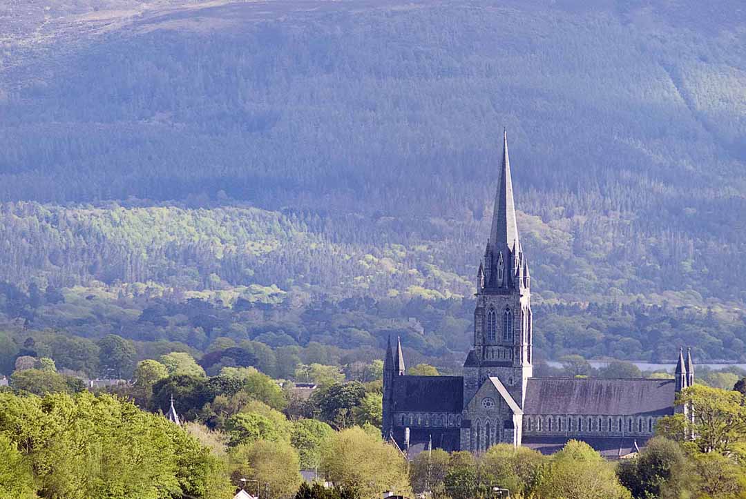 Killarney Cathedral using a zoom lens with Mountains in background