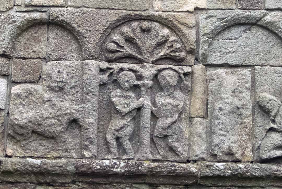 Stone figures on the wall of Ardmore Cathedral.