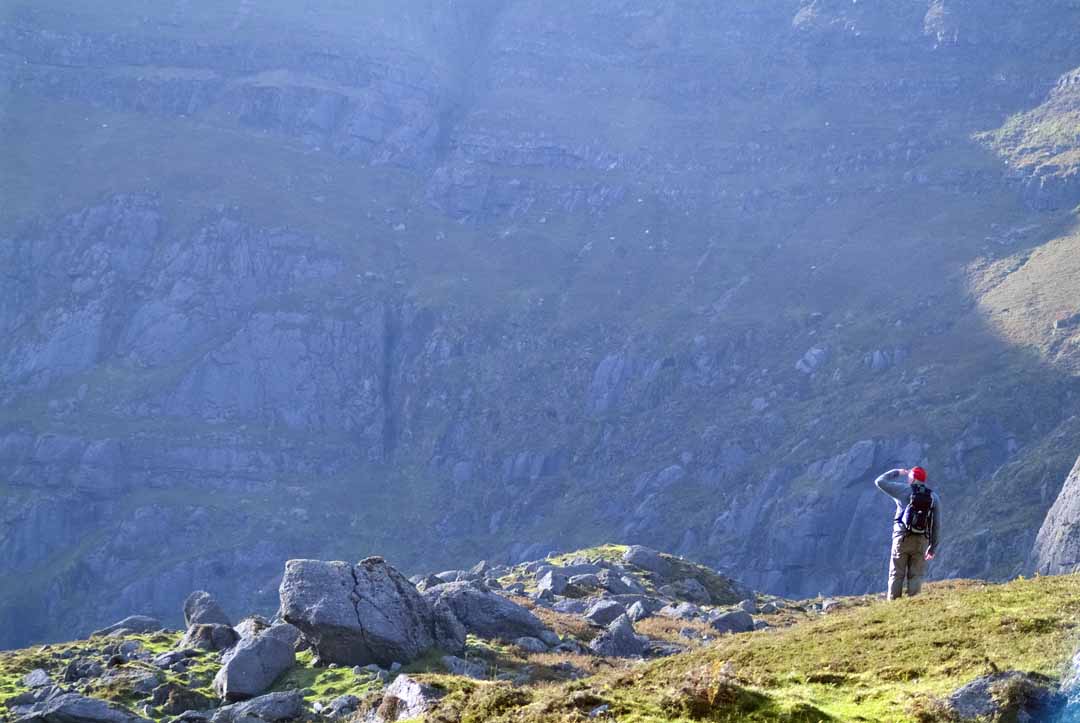 A man walking in the Comeragh Mountains