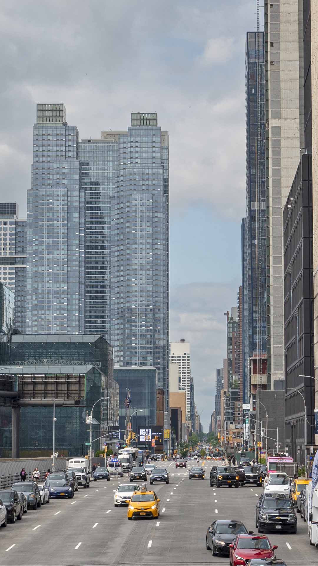 a city street with tall buildings