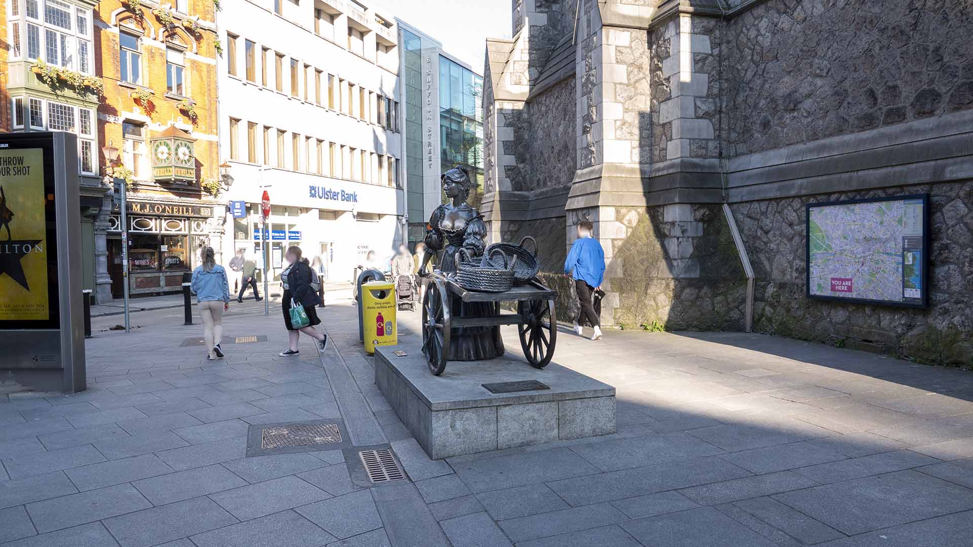 A statue of a woman with a cart, Molly Malone