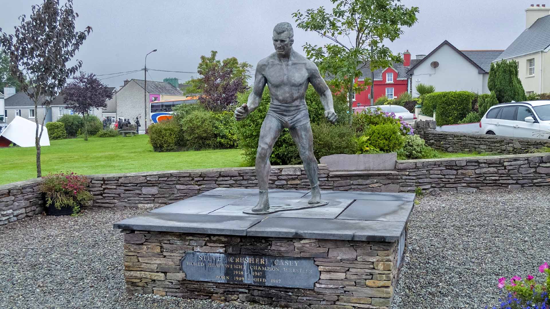 a statue of a man in a boxing suit