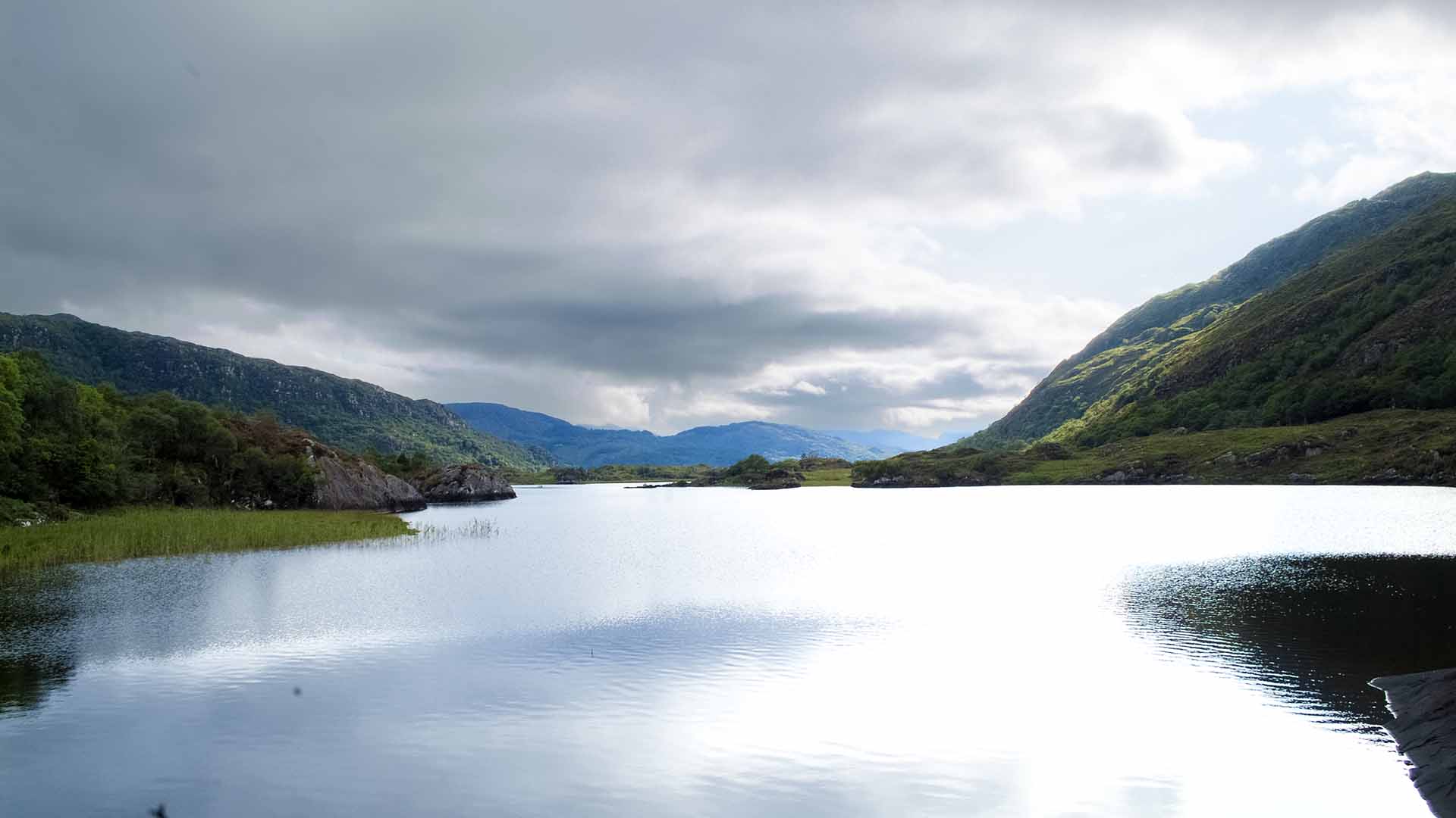 a lake surrounded by mountains