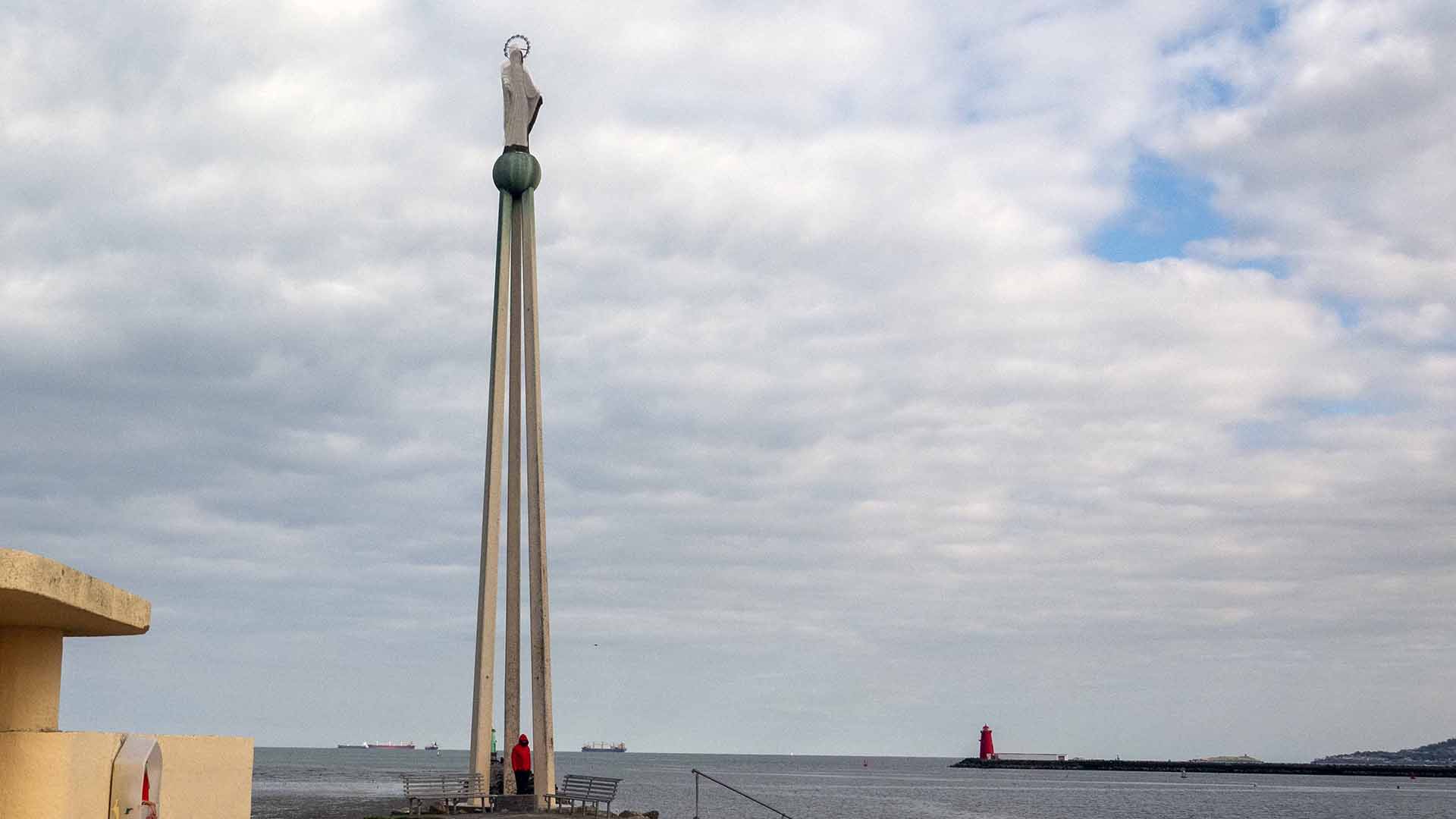 a statue on a pier