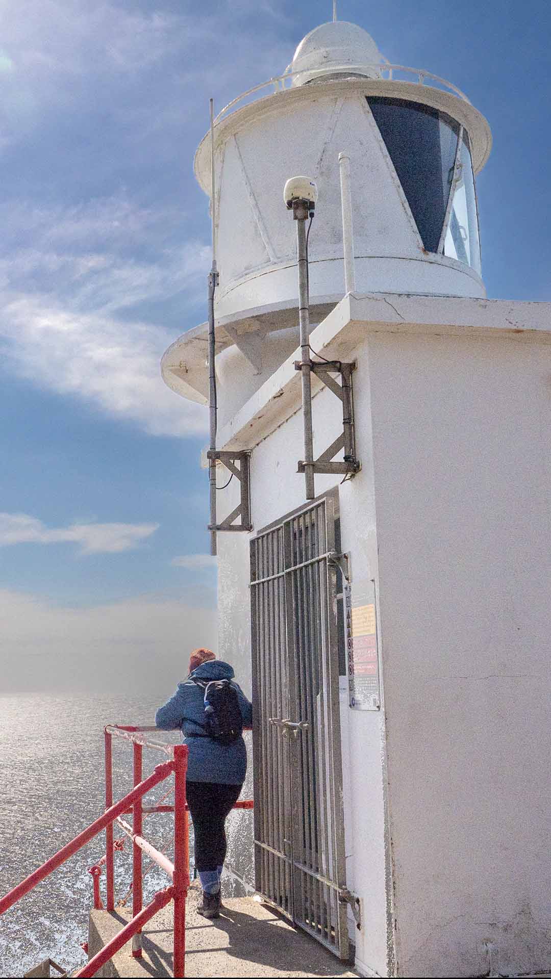 a person standing on a white building